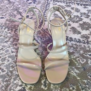 Nude strappy heel. Size 8.5. Only worn once!